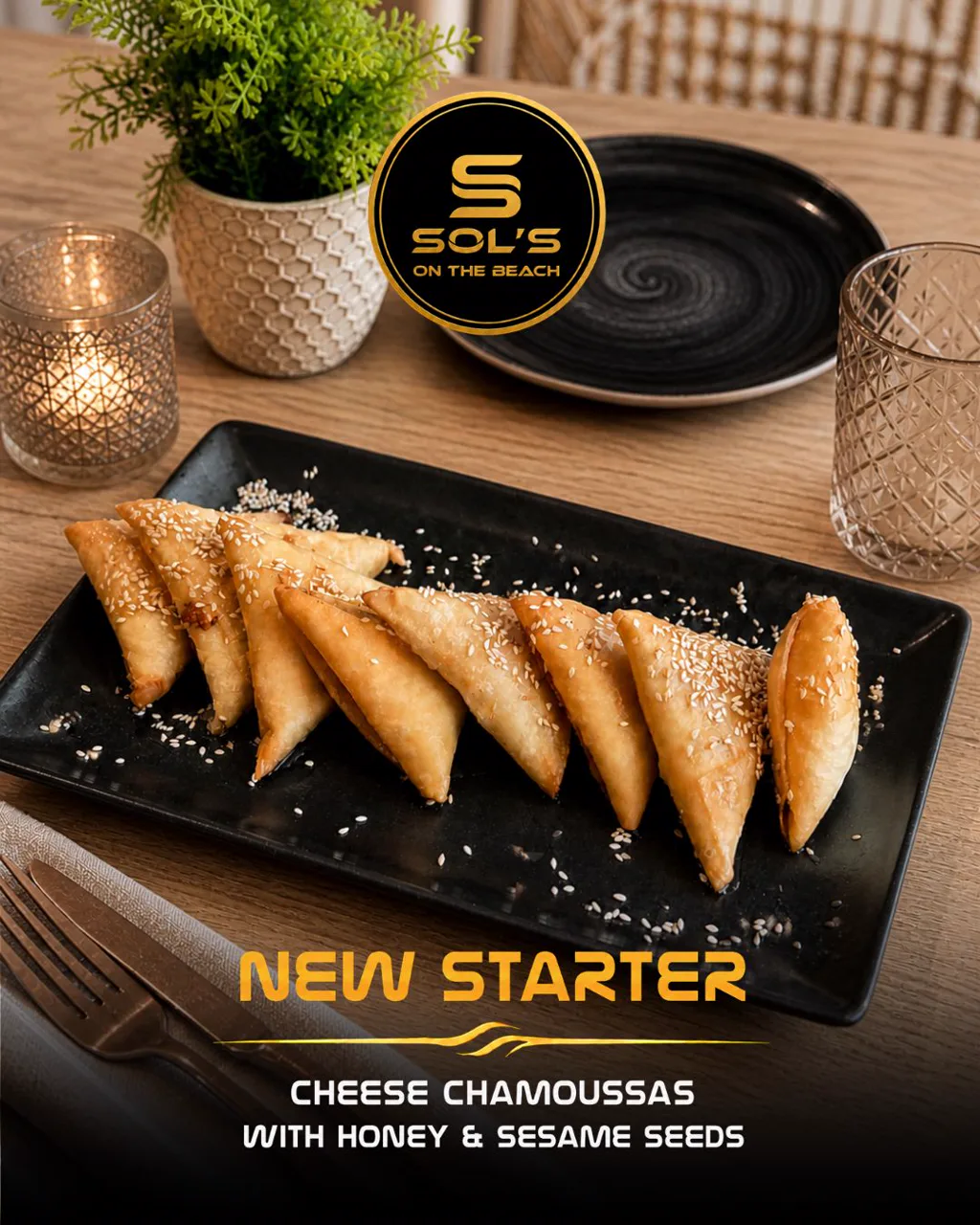 Cheese chamoussas starter with honey and sesame seeds