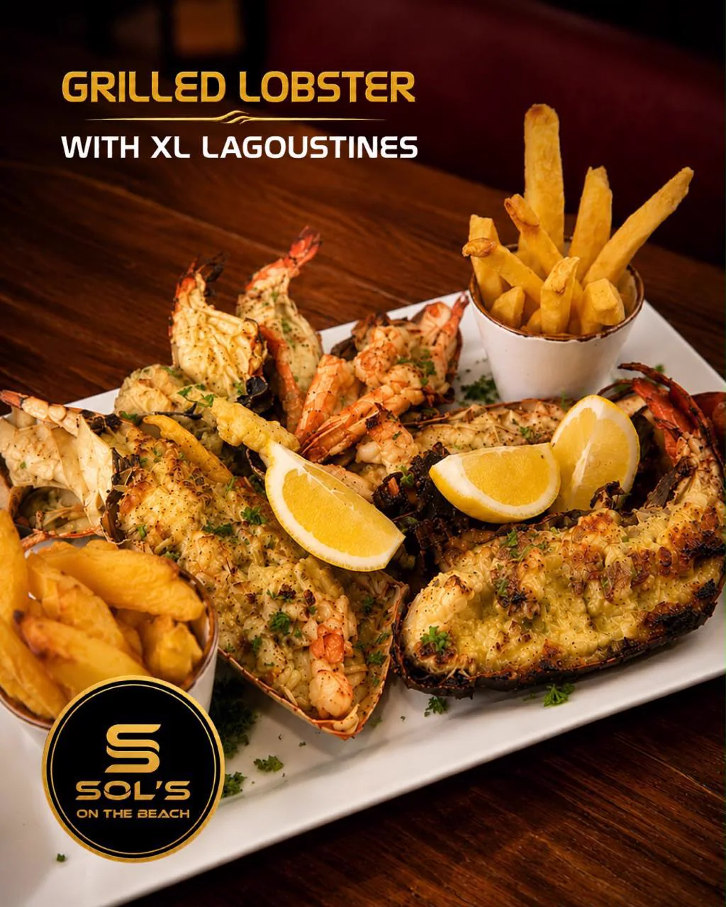Grilled lobster with XL langoustines at Sol's On The Beach in Strand