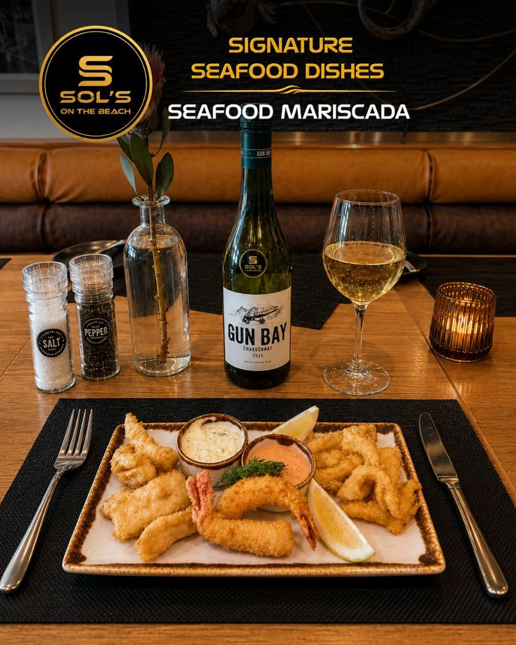 Seafood Mariscada with Gun Bay wine at Sol's On The Beach in Strand